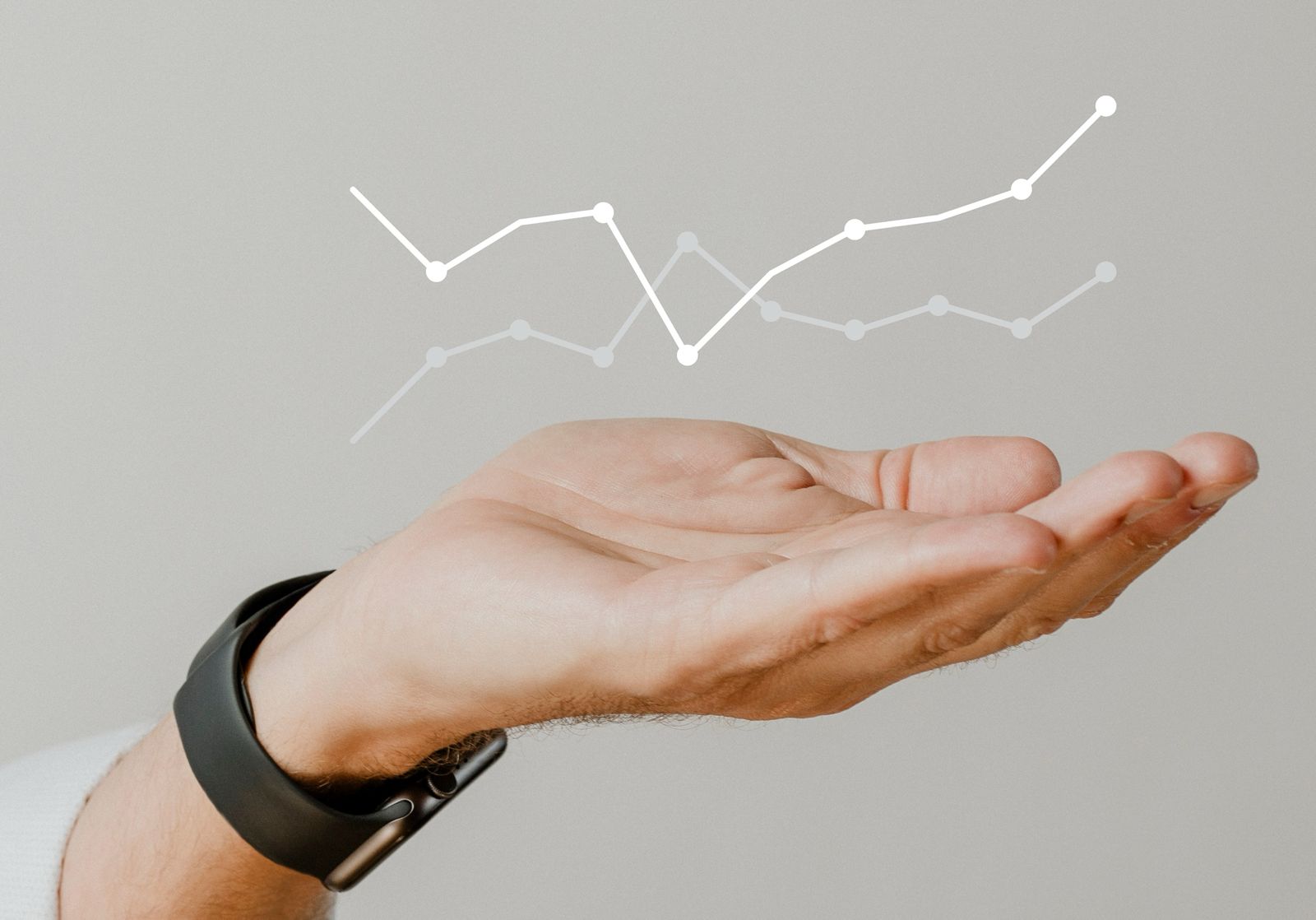 Business hand presenting rising growth graph – Dharmshil Group
