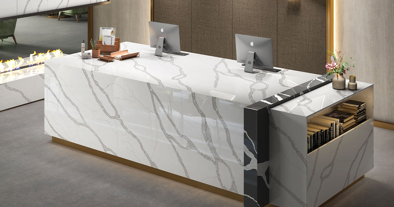 Kitchen island covered with white marble-look porcelain tiles