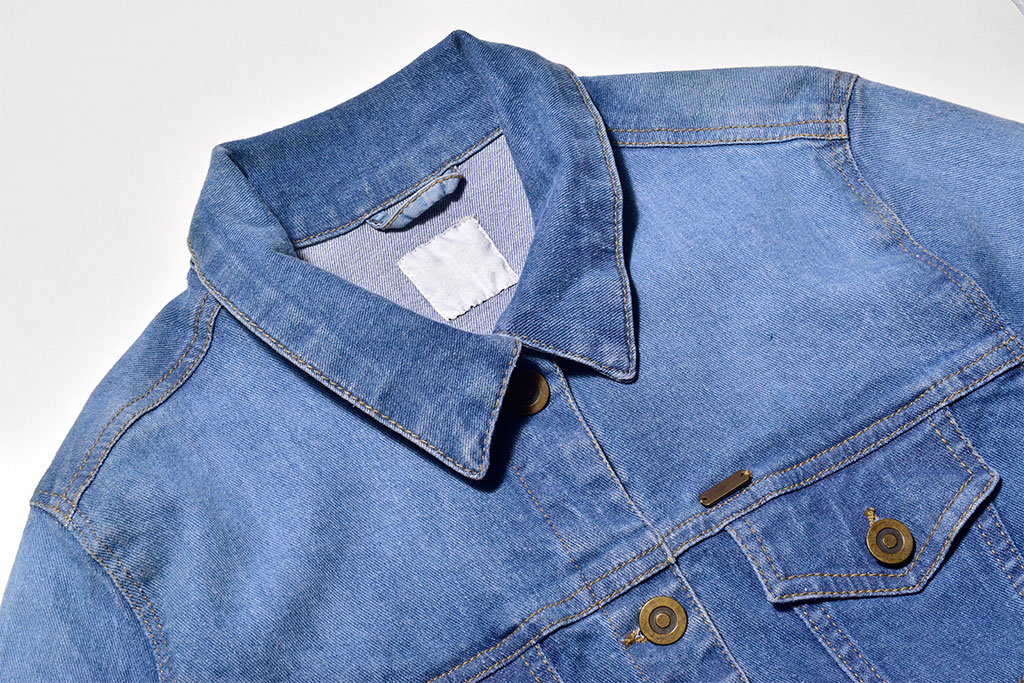 Folded denim shirts prepared for textile export and international apparel shipments